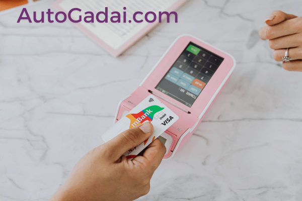 perbedaan kartu kredit dan debit
